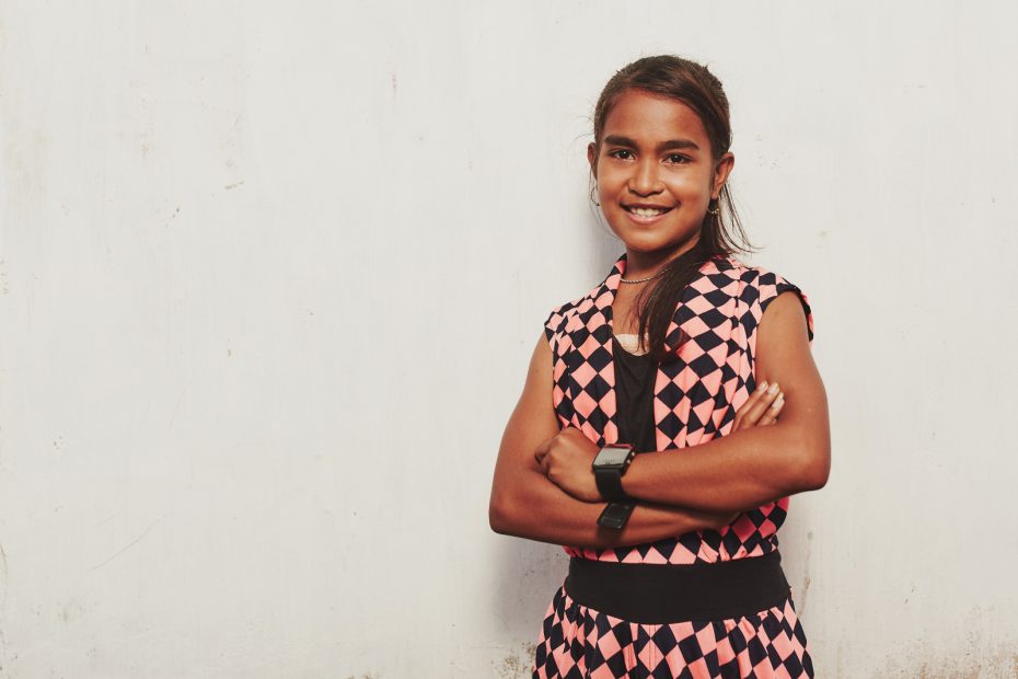 girl standing with arms crossed