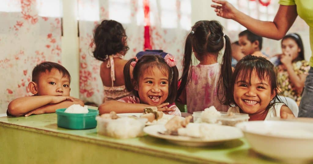 One word to move us in 2018: compassion Children Eating