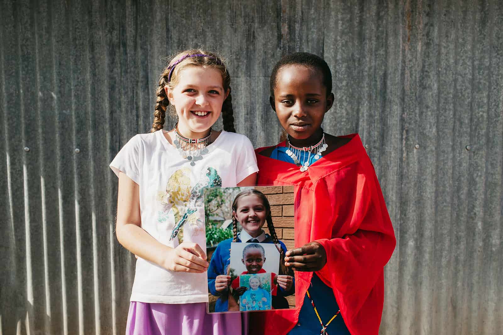 A young girl with her sponsored child