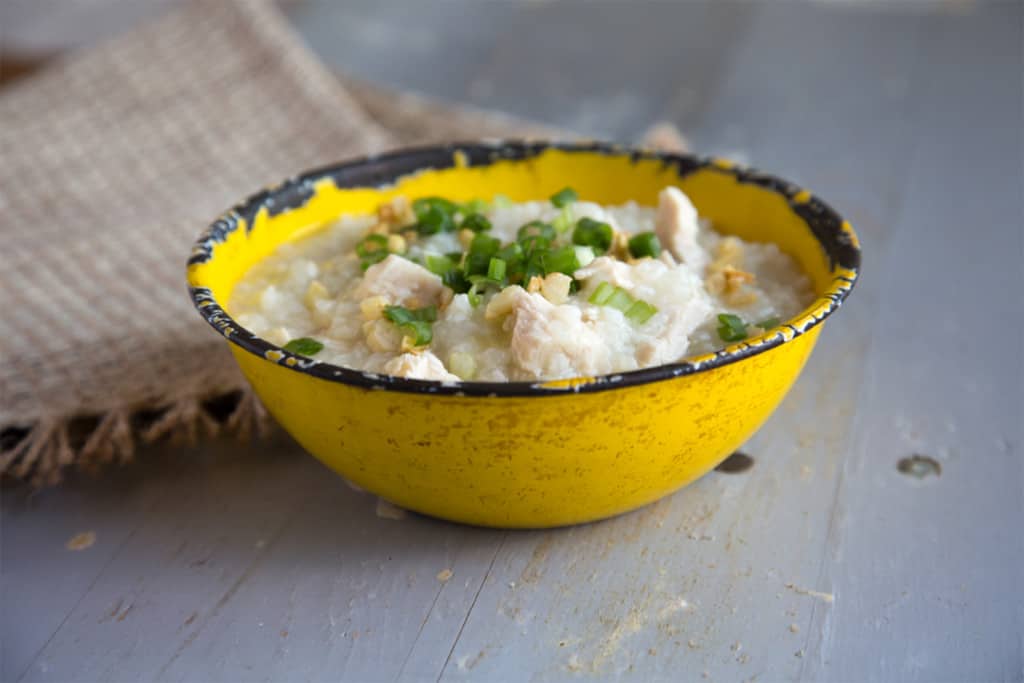 Bowl of Filipino Lugaw on a table