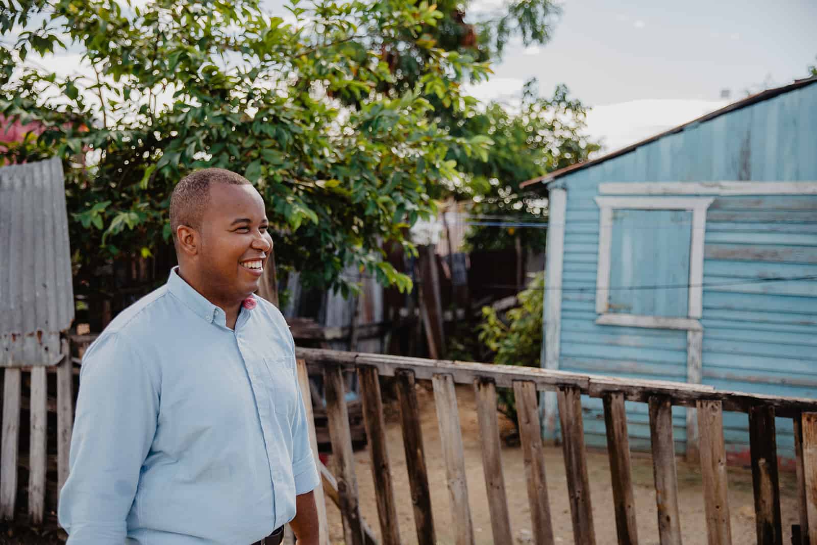 Tony Beltran walks down a street in the Dominican Republic.