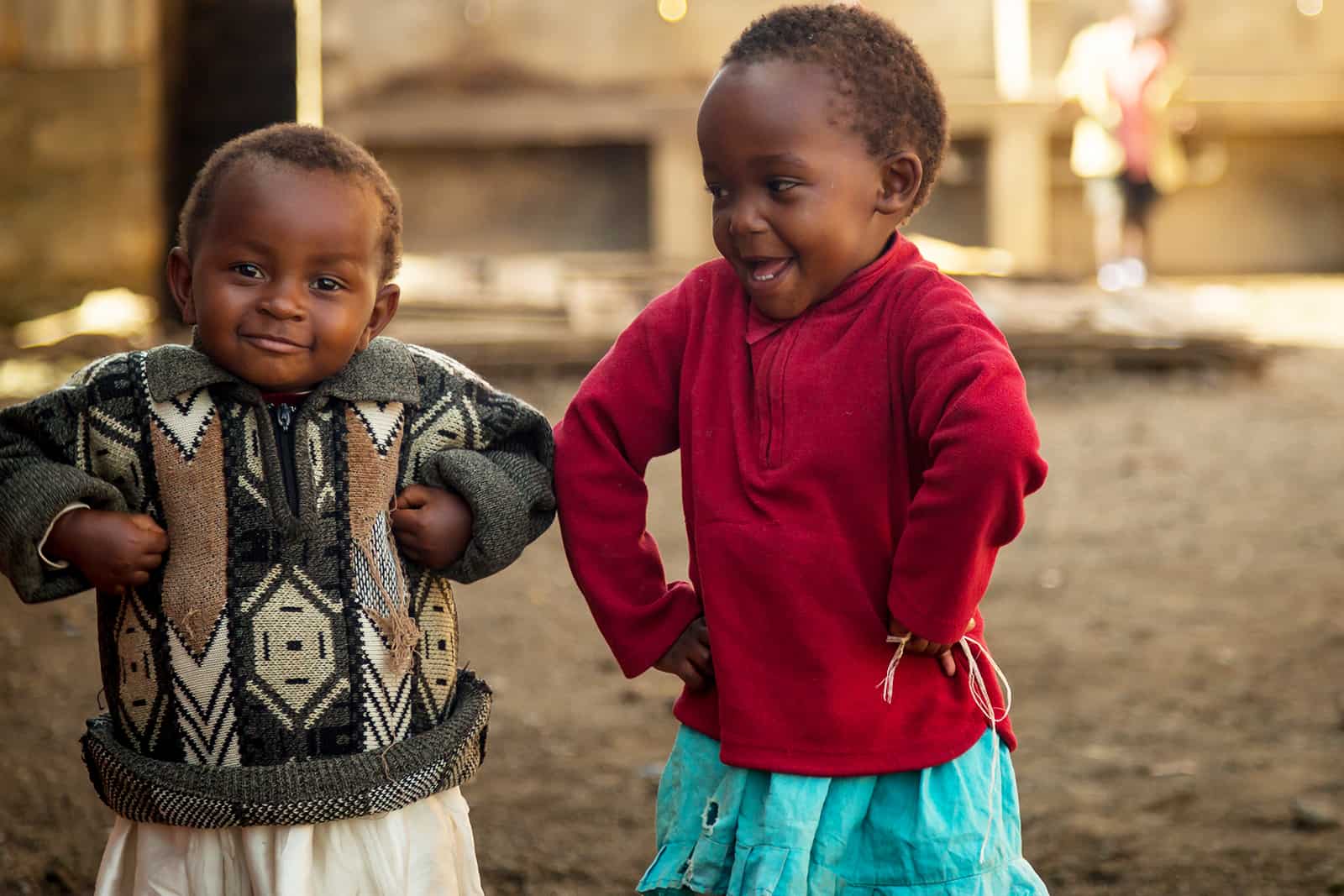 Two girls in Kenya doing the chicken dance