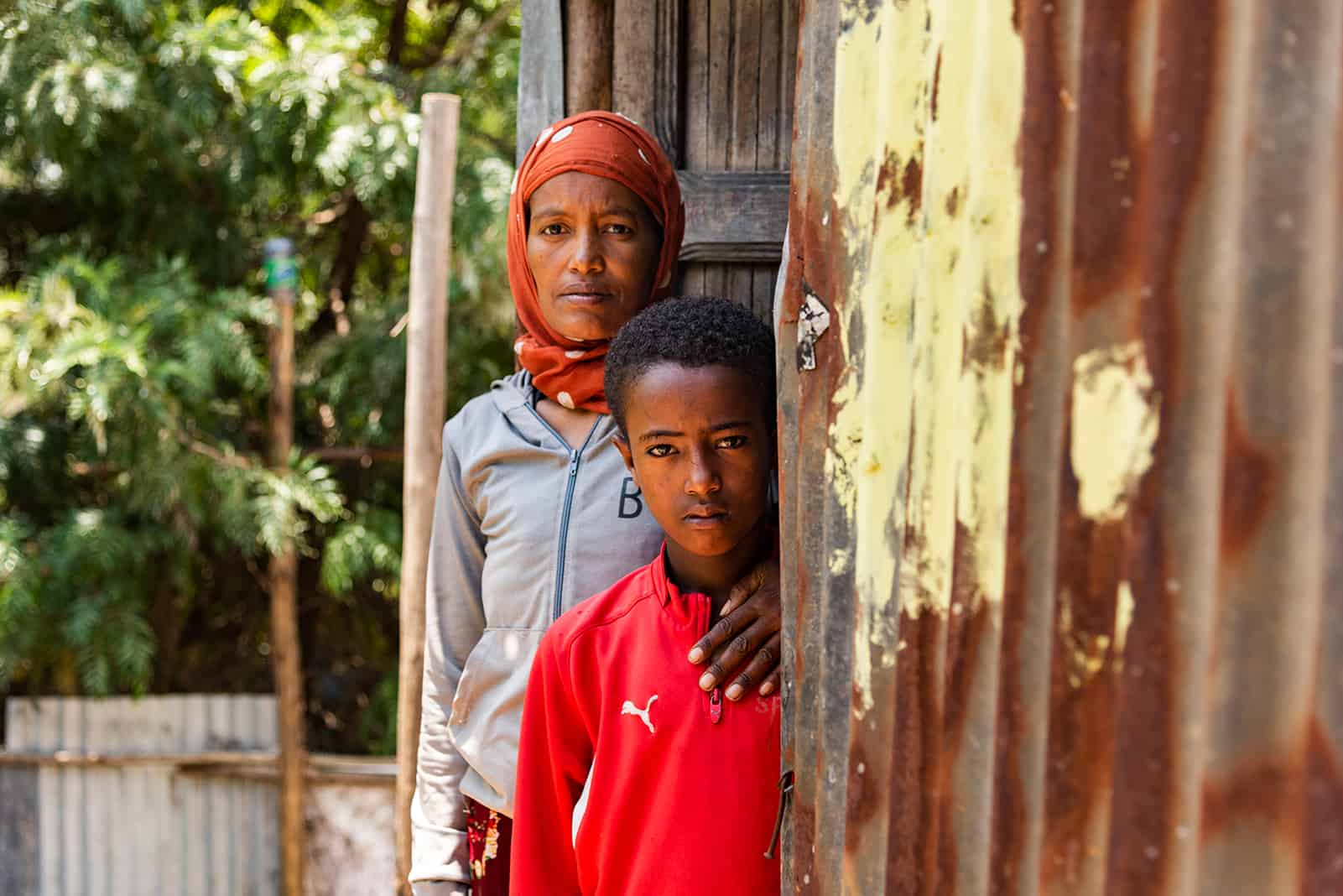 Sofia and Abueker Jemal standing in a doorway