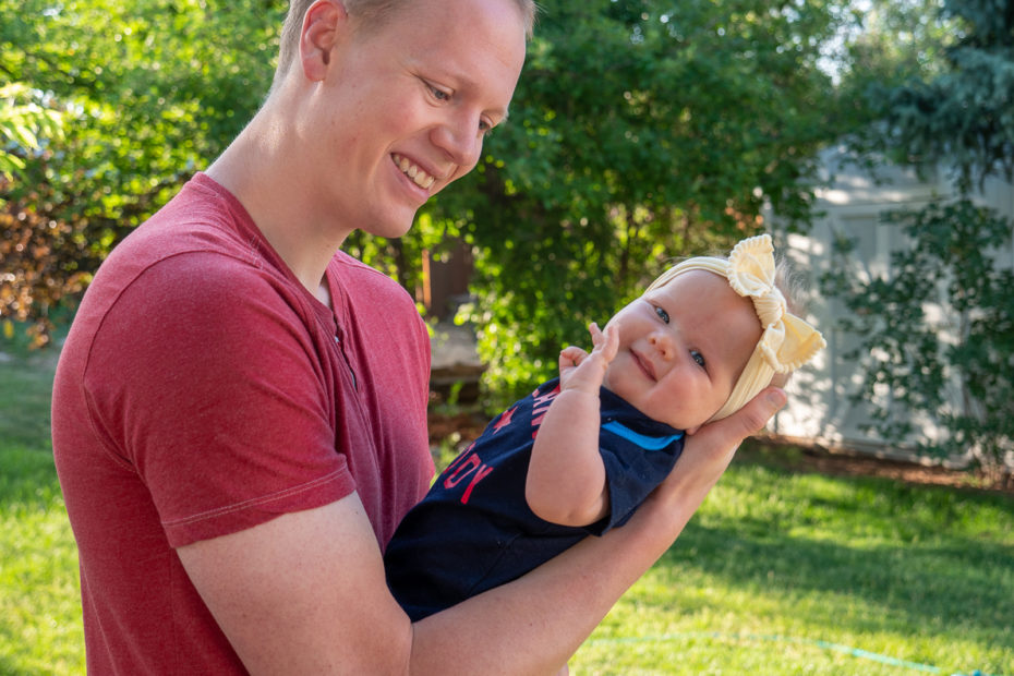 Rich Martinson holding is daughter