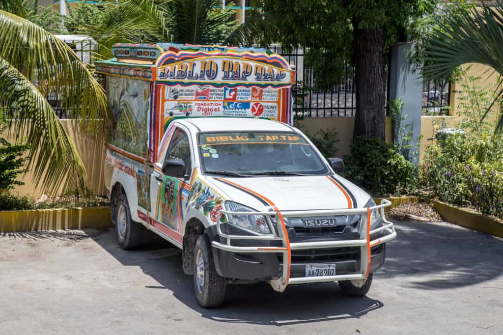 Brightly colored truck used as a taxi