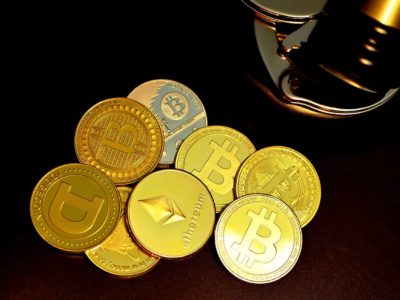 A photo depicting cryptocurrency coins such as bitcoin, Ethereum and Dogecoin