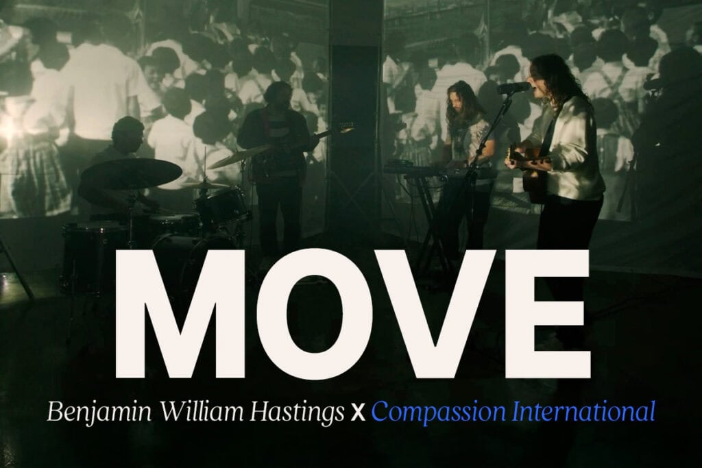 Image shows the words "Move" in front of Benjamin William Hasting's band.